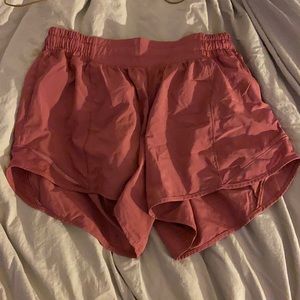 Pink lululemon hotty hot 4 inch shorts